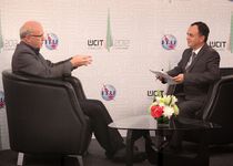 Mr Paul Budde, Indepedent Telecommunications Analyst, BuddeComm being interviewed by Maximillian Jacobson - Gonzalez, ITU in the ITU TV Studio WCIT 2012, Dubai, UAE. December 2012.